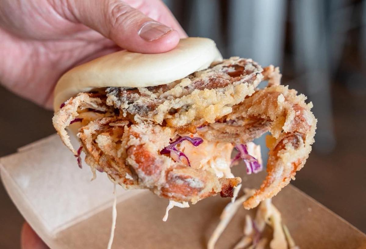 Fat Bao’s Crab Daddy bao stuffs a crispy fried soft shell crab into a pillowy steamed bun with Asian slaw and spicy mayo for the ultimate handheld bite. | Photo by Fat Bao