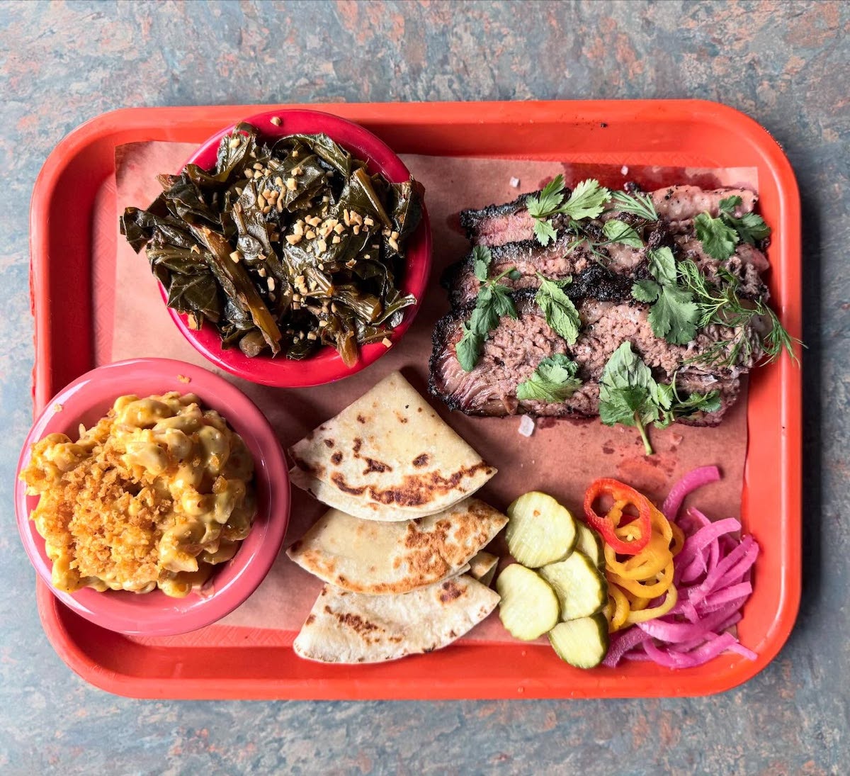 Gene's brisket plate with sides and traditional accompaniments at Gene's BBQ. | Photo by Gene's BBQ