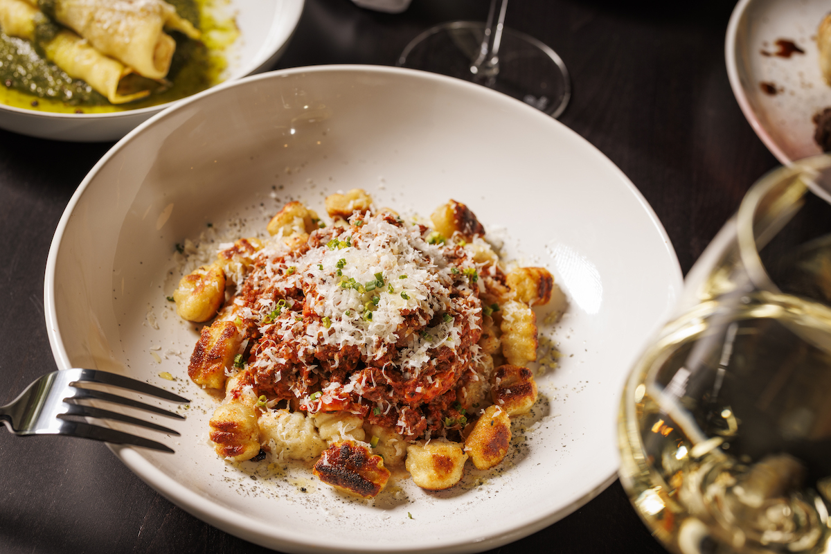 Gnocchi bolognese at Trattoria Bugatti is pure comfort in a bowl. | Photo by Samantha Marie Photography