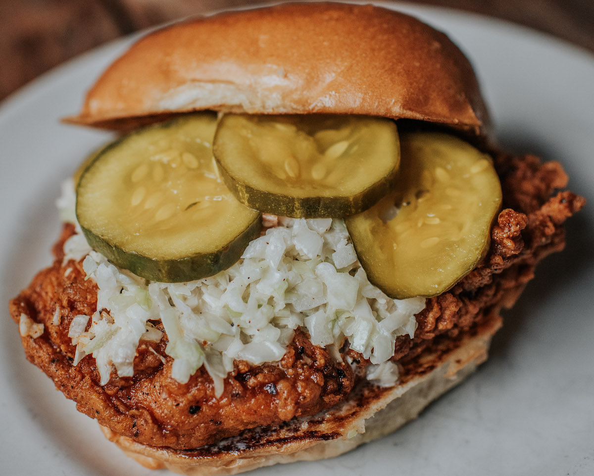 Hop’s Chicken’s chef’s special layers crispy fried chicken with slaw and pickles for one of Atlanta’s standout hot chicken sandwiches. | Photo by Jamestown