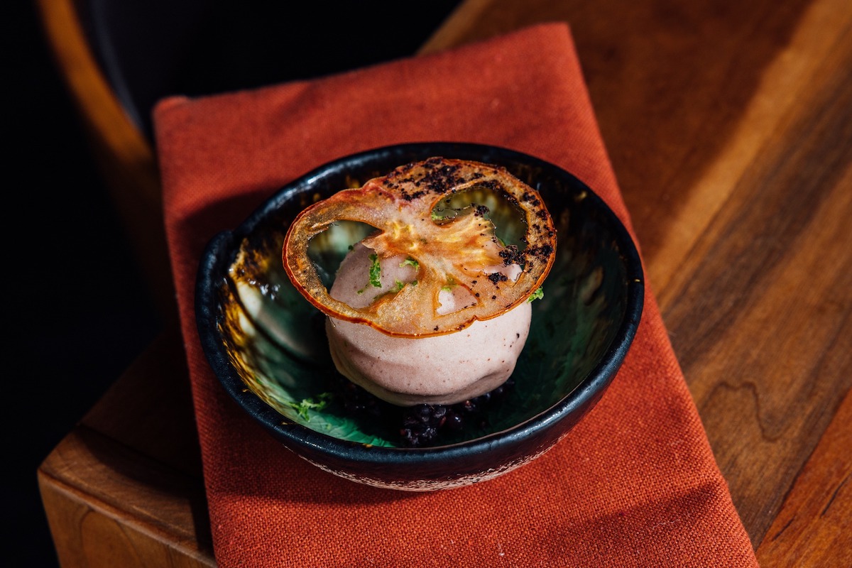 At Ishtia, chef David Skinner transforms tomatoes into an artful dessert, showcasing the restaurant’s imaginative, story-driven approach to fine dining. | Photo by Ishtia