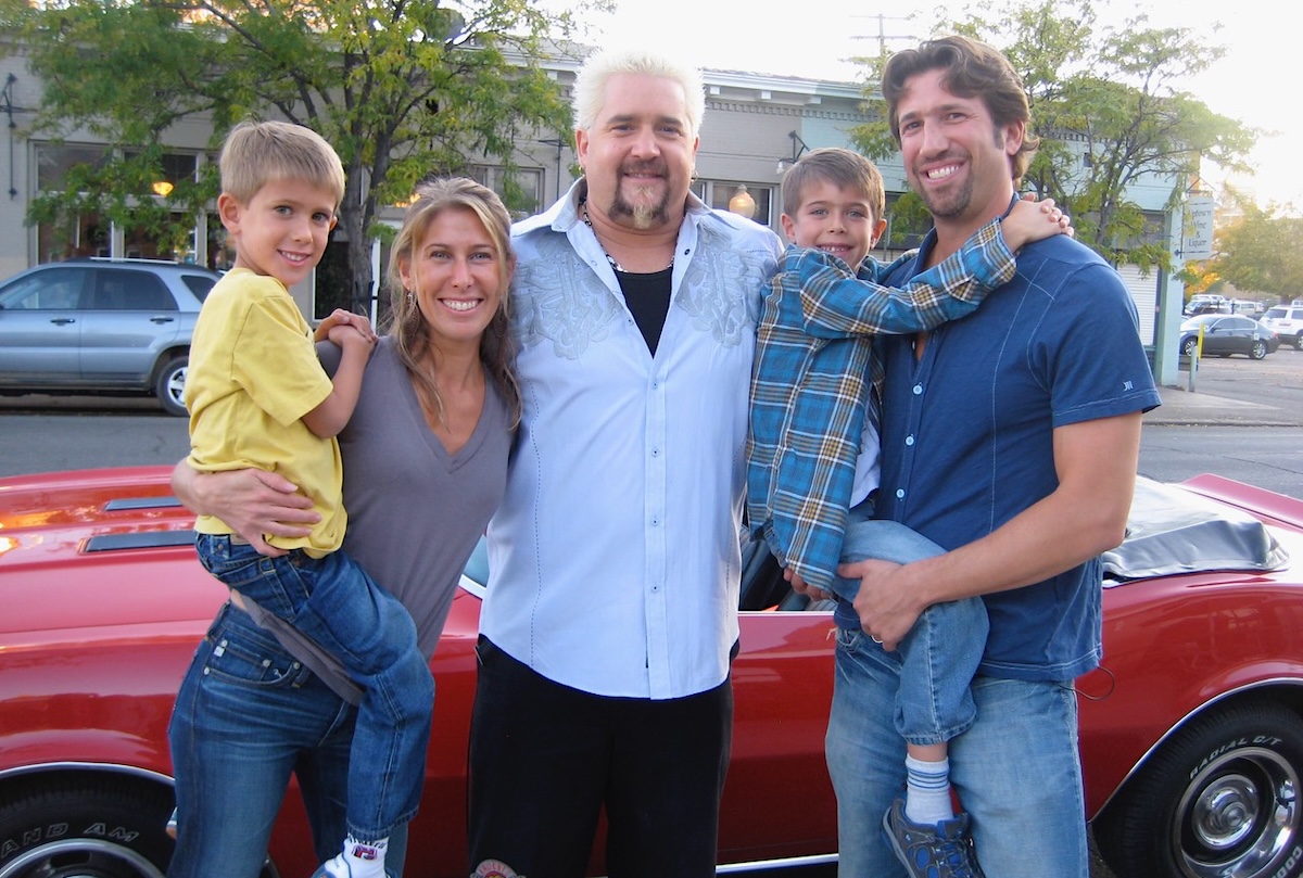 Jen and Josh Wolken with their then little kids and celebrity chef Guy Fieri. | Photo courtesy of Josh Wolkon