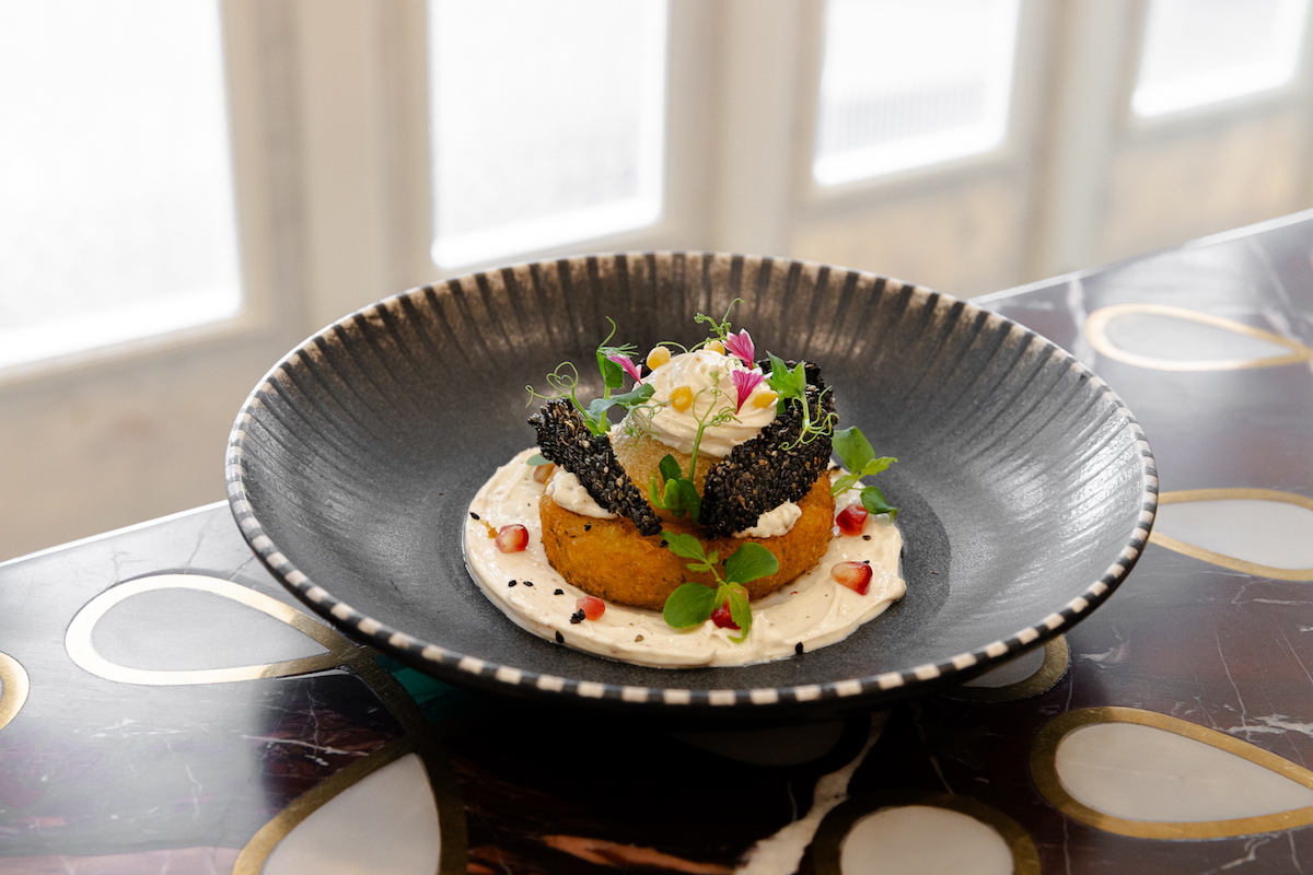 The first course in Musaafer's Mother's Day menu is a dahi puri tikki, which represents Awakening, the Onset of Adulthood. | Photo by Michelle Giang