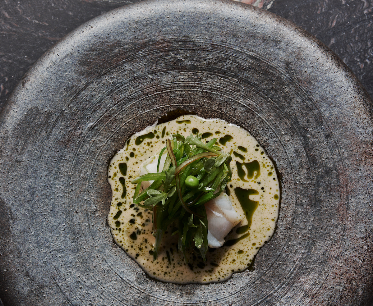 Hata sakemushi with kombu, bell pepper, peas, blanquette and chive oil at Mujō. | Photo by Andrew Thomas Lee 