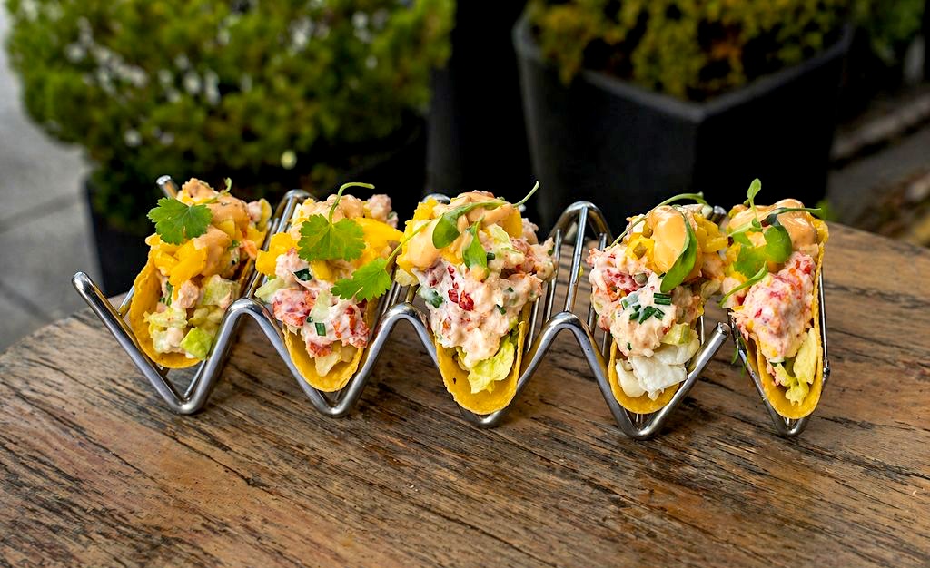 Lobster tacos are hot this summer in NYC. | Photo courtesy of Industry Kitchen 