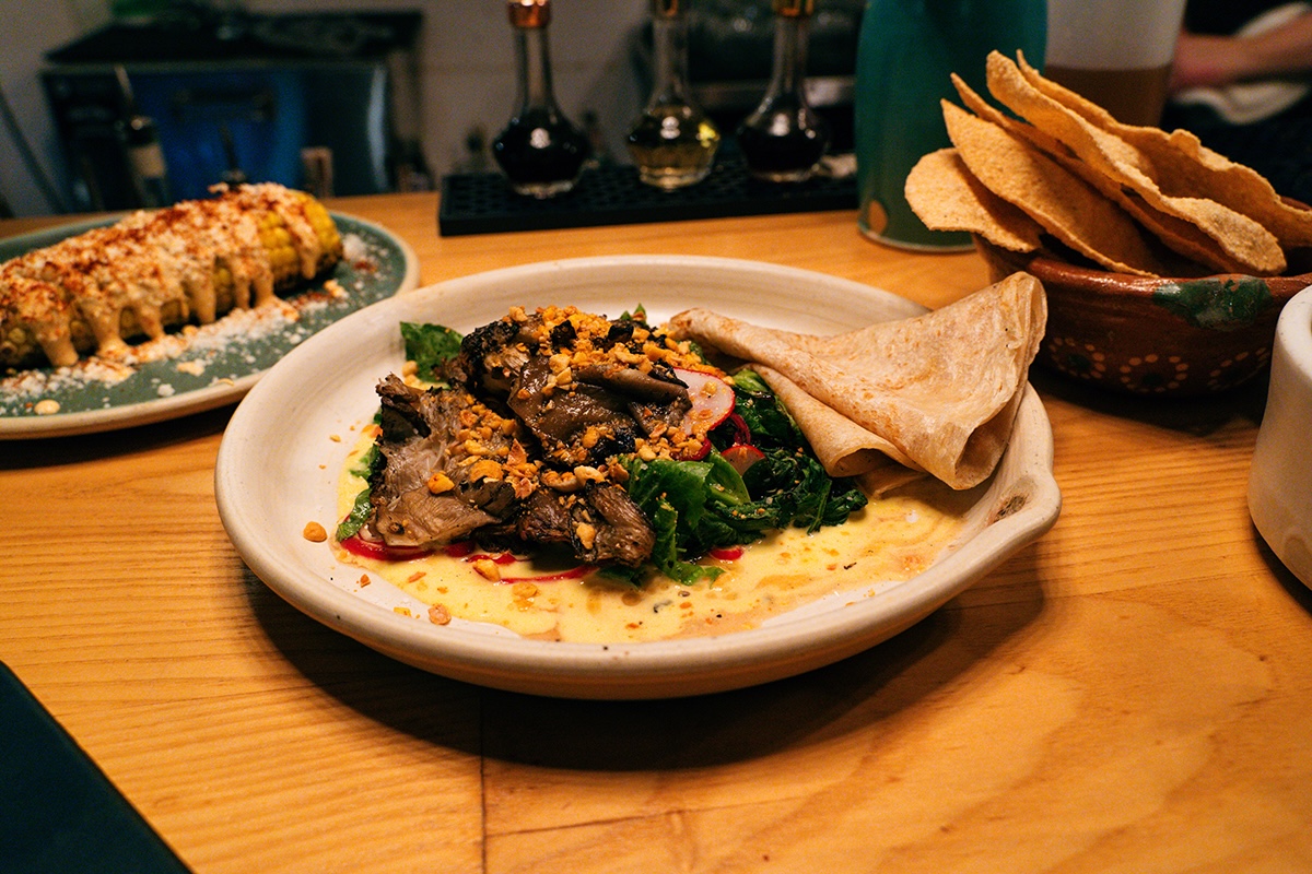 PHX_Bacanora 2_Photo Credit Paul Dedewo - DiningOut At Bacanora, wood-fired dishes, including short ribs and sweet elote topped with fiery chiltepins, showcase traditional Sonoran flavors. | Photo by Paul Dedewo