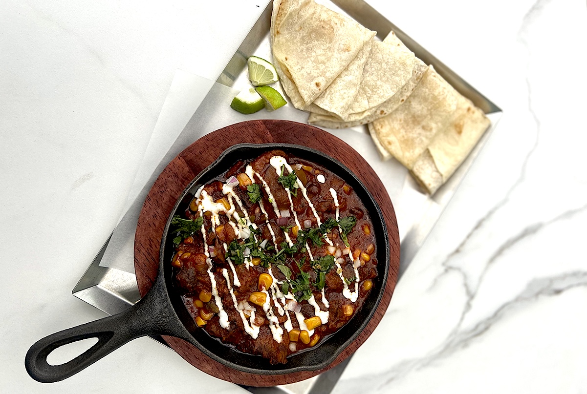 PHX_Cielito_Lamb and mushroom stew_Courtesy of Cielito - DiningOut Stewed lamb and foraged mushrooms are given a spicy kick with poblano, ancho, and chiltepin peppers. | Photo courtesy of Cielito