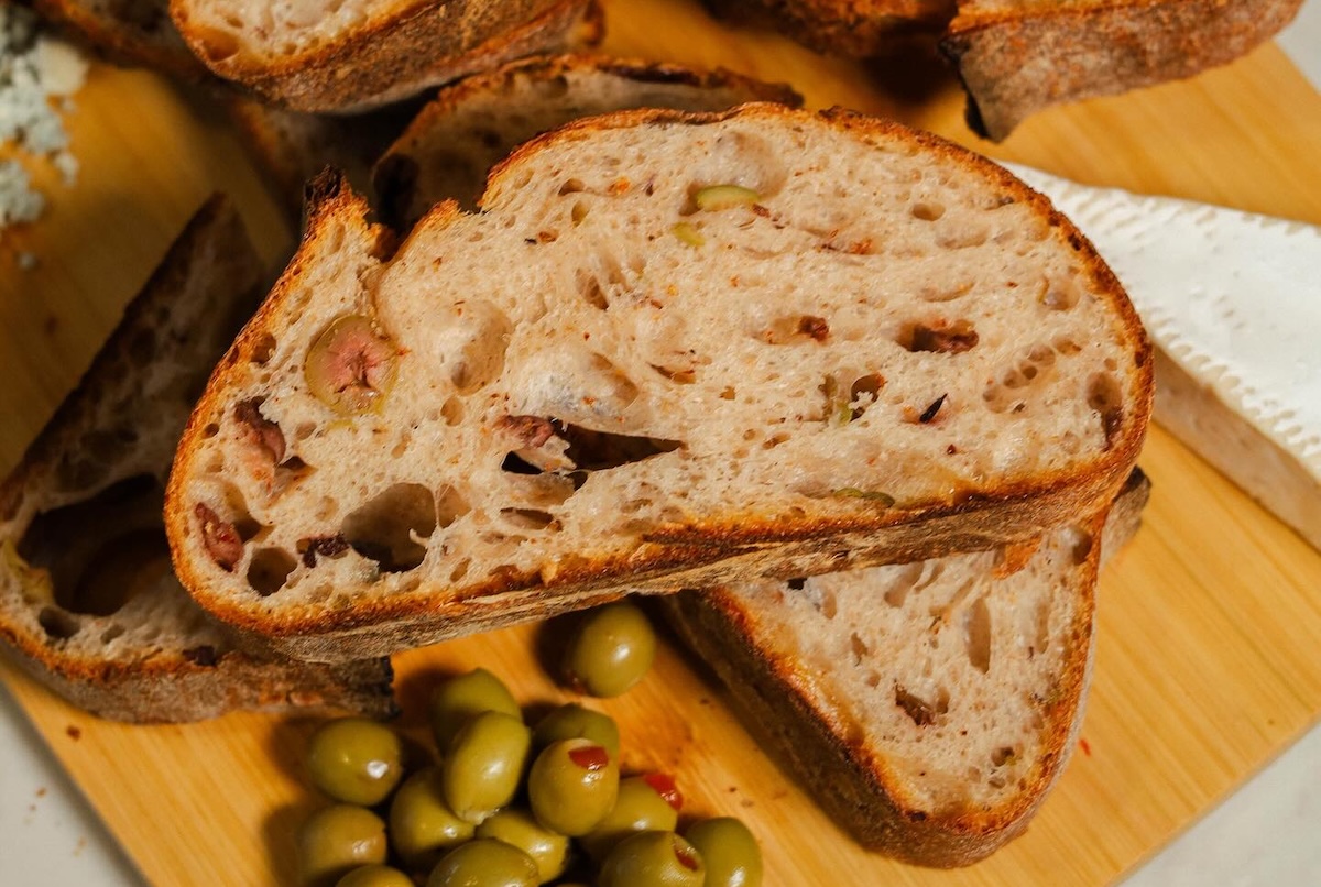 Don't miss this olive-studded bread. | Photo courtesy of Noble Bread