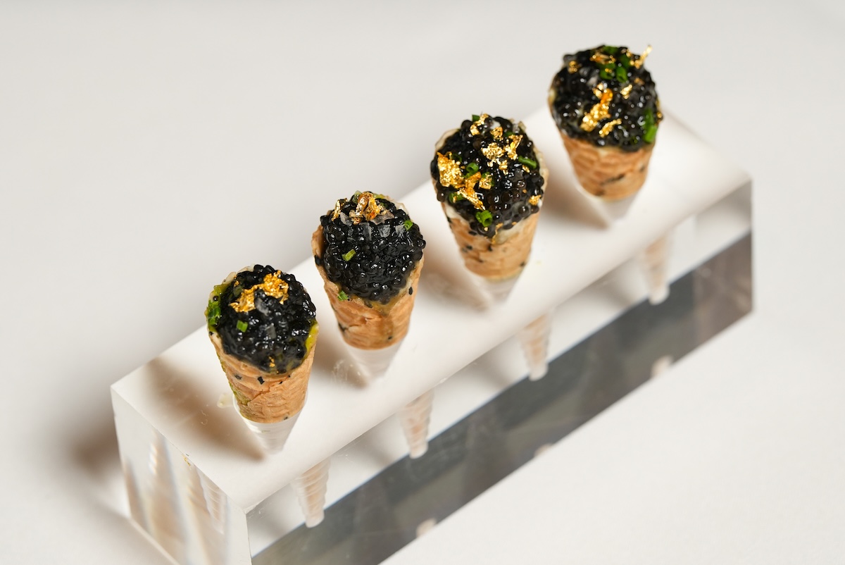 Ocean 44 is noteworthy for its luxe setting and menu items like these caviar cones. | Photo courtesy of Ocean 44