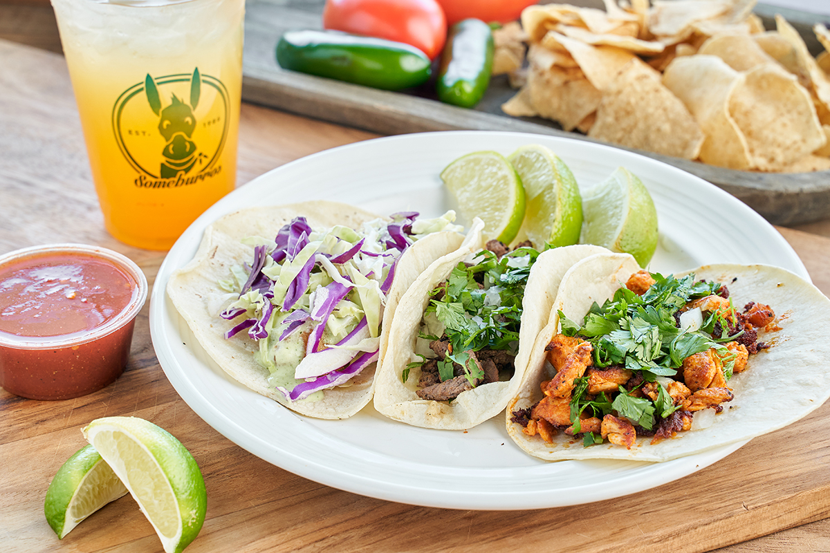 PHX_Someburros Tacos 2_Courtesy of Someburros - DiningOut Mix and match your tacos with the Tres Tacos meal that features your choice of three tacos, including pollo asado, carne asada, fish, or vegan. | Photo courtesy of Someburros