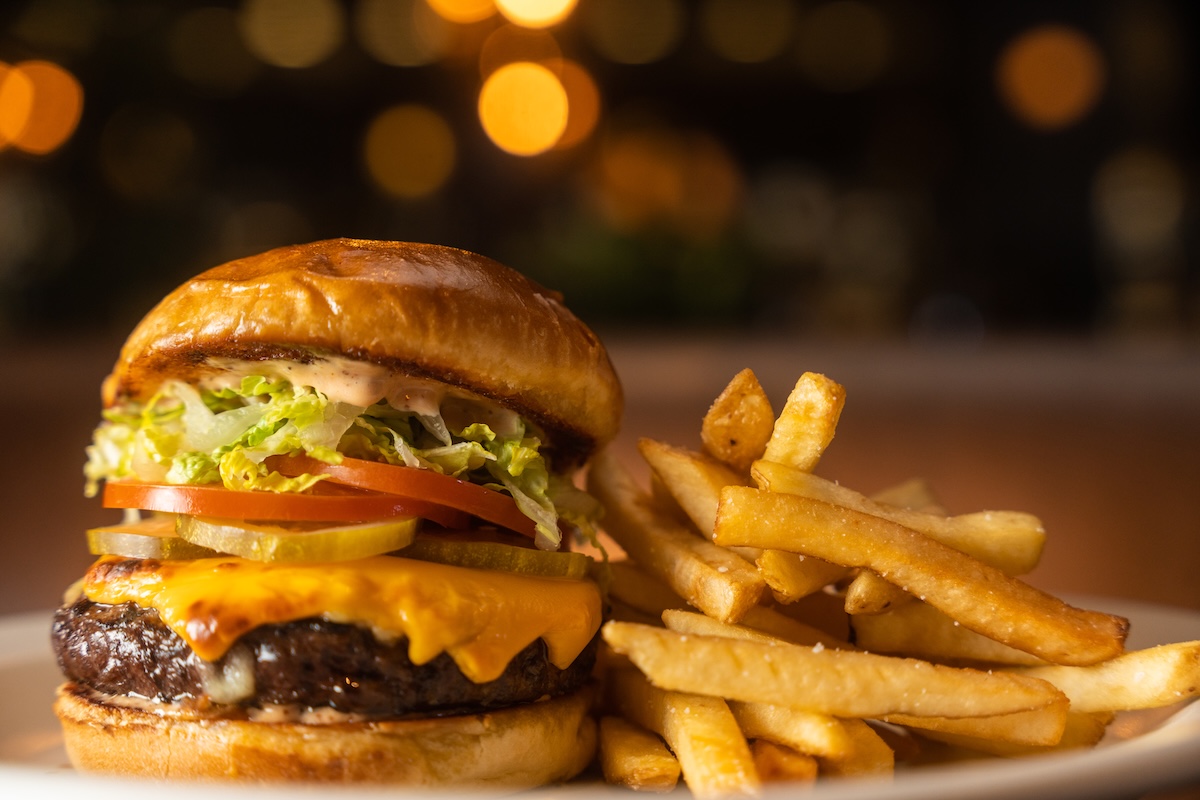 The Wagyu hamburger is made with a 6-ounces of rich American wagyu beef then packed with classic toppings. | Photo courtesy of The Henry