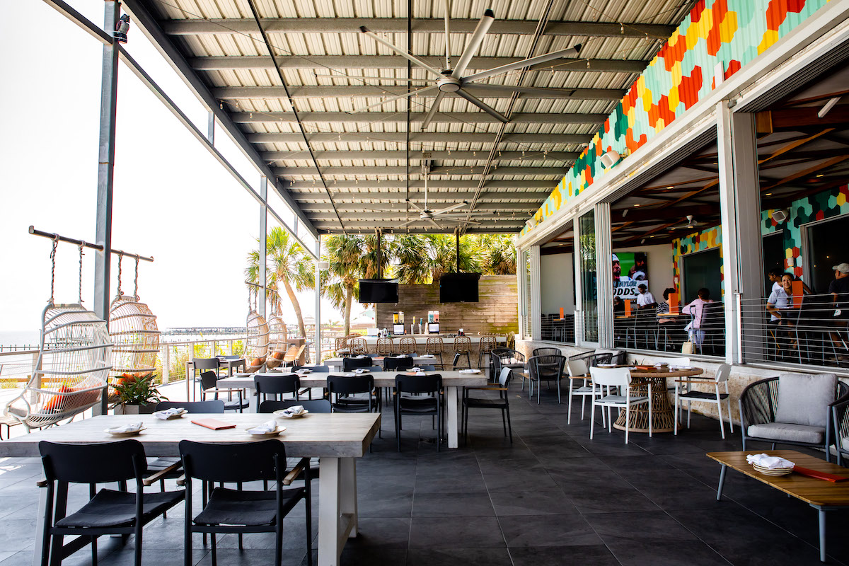Pier 6 Seafood & Oyster House pairs fresh Gulf seafood with sweeping waterfront patio views in San Leon, making it a favorite for long lunches and sunset dinners alike. | Photo by Kirsten Gilliam