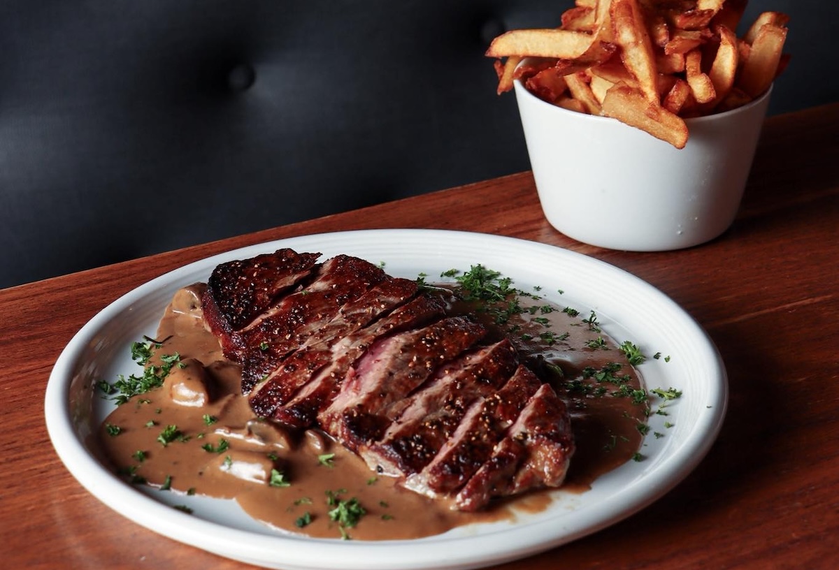 A classic steak frites. | Photo courtesy of Cuisine & Wine Bistro 