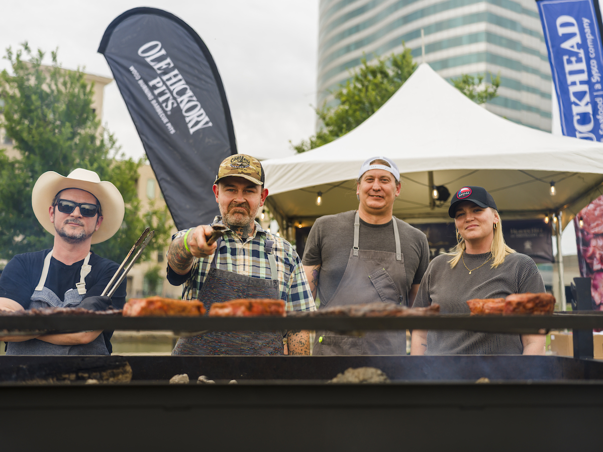 Attendees enjoyed up close steak grilling action at RARE Dallas. | Photo by Dacoge Media