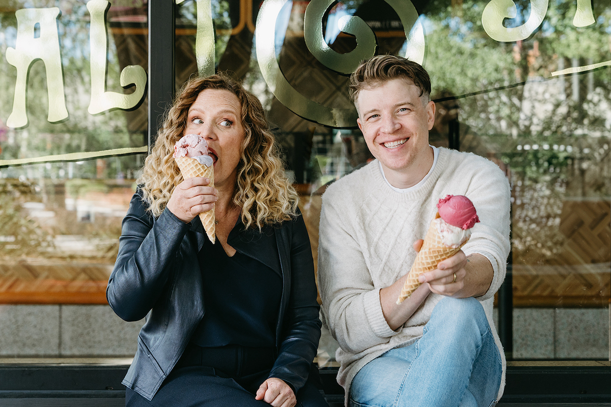 Salt & Straw founders and cousins Kim and Tyler Malek pose outside one of the company’s scoop shops. | Photo by Salt & Straw