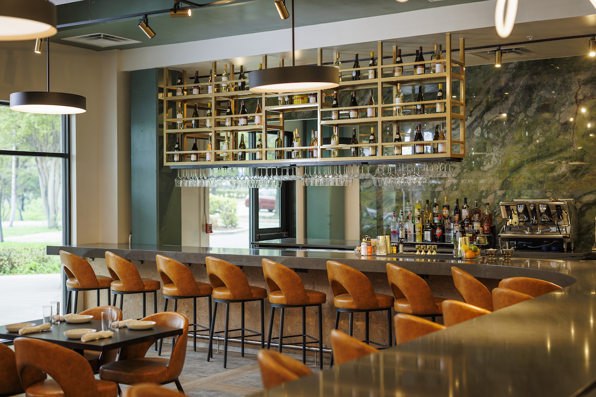The bar at Trattoria Bugatti. | Photo by Samantha Marie Photography