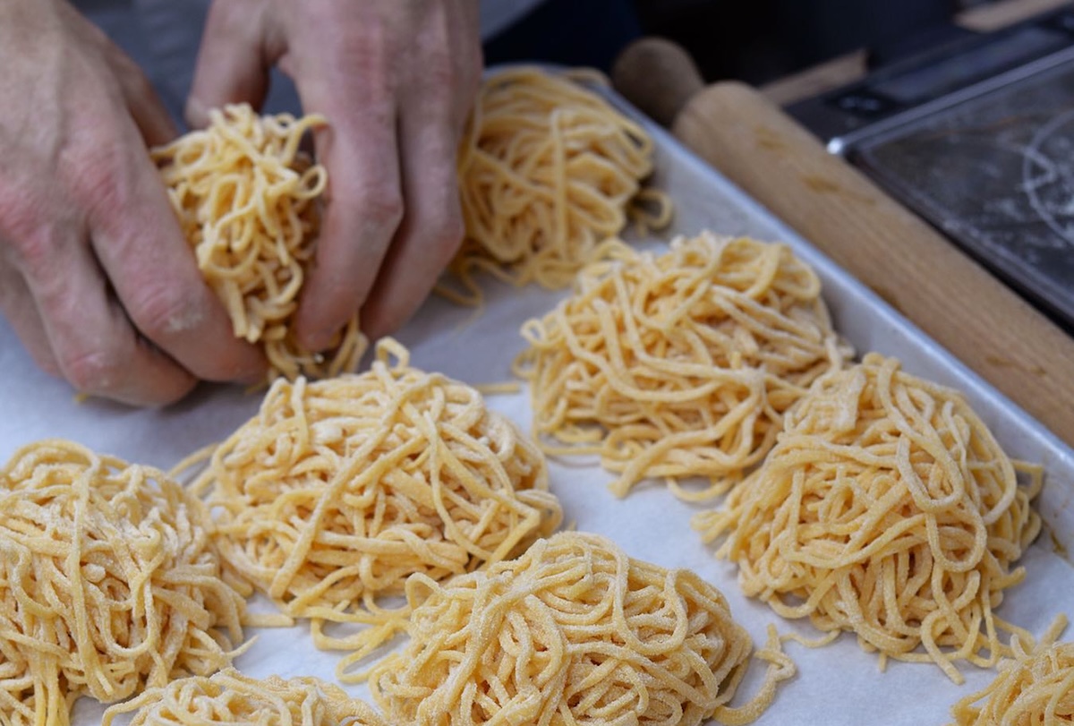Handmade pasta is one of the perks of dining at Charlie Bird in NYC. | Photo courtesy of Charlie Bird