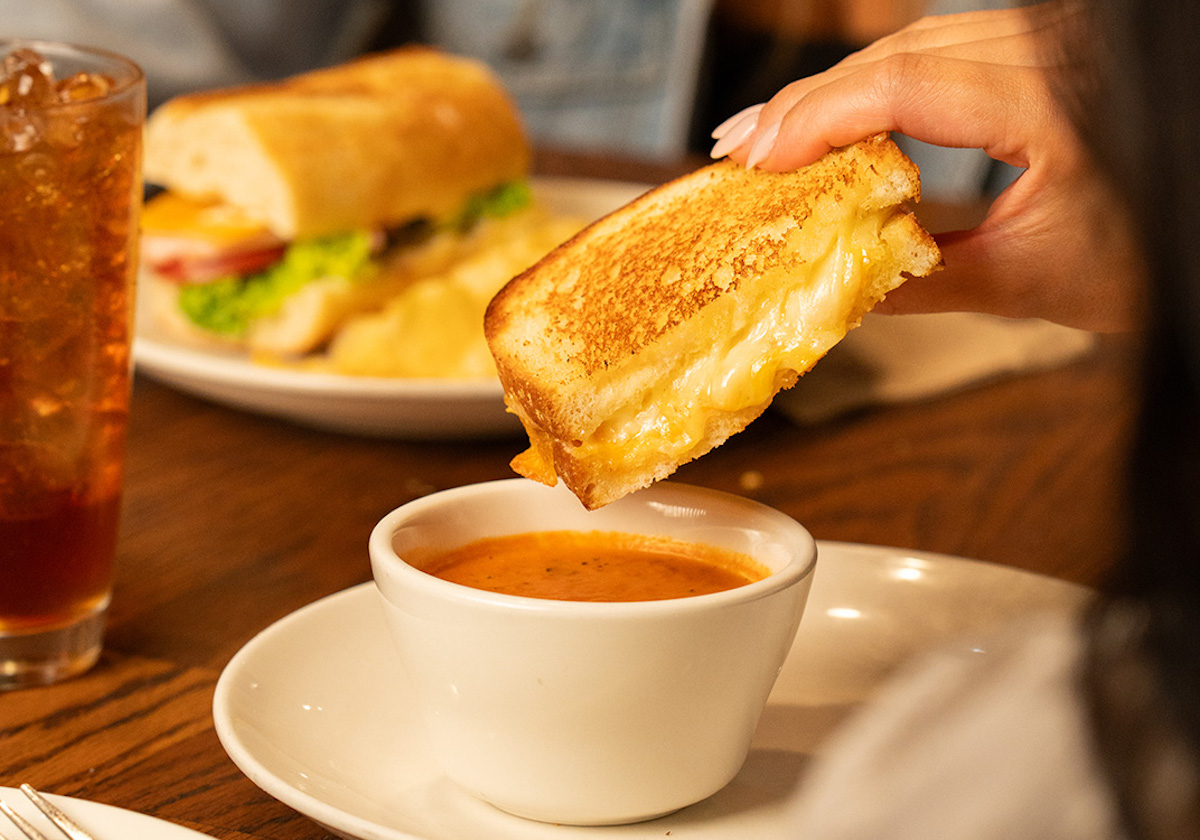 la Madeleine - DiningOut La Madeleine’s signature tomato basil soup and four-cheese grilled cheese sandwich. | Photo by la Madeleine
