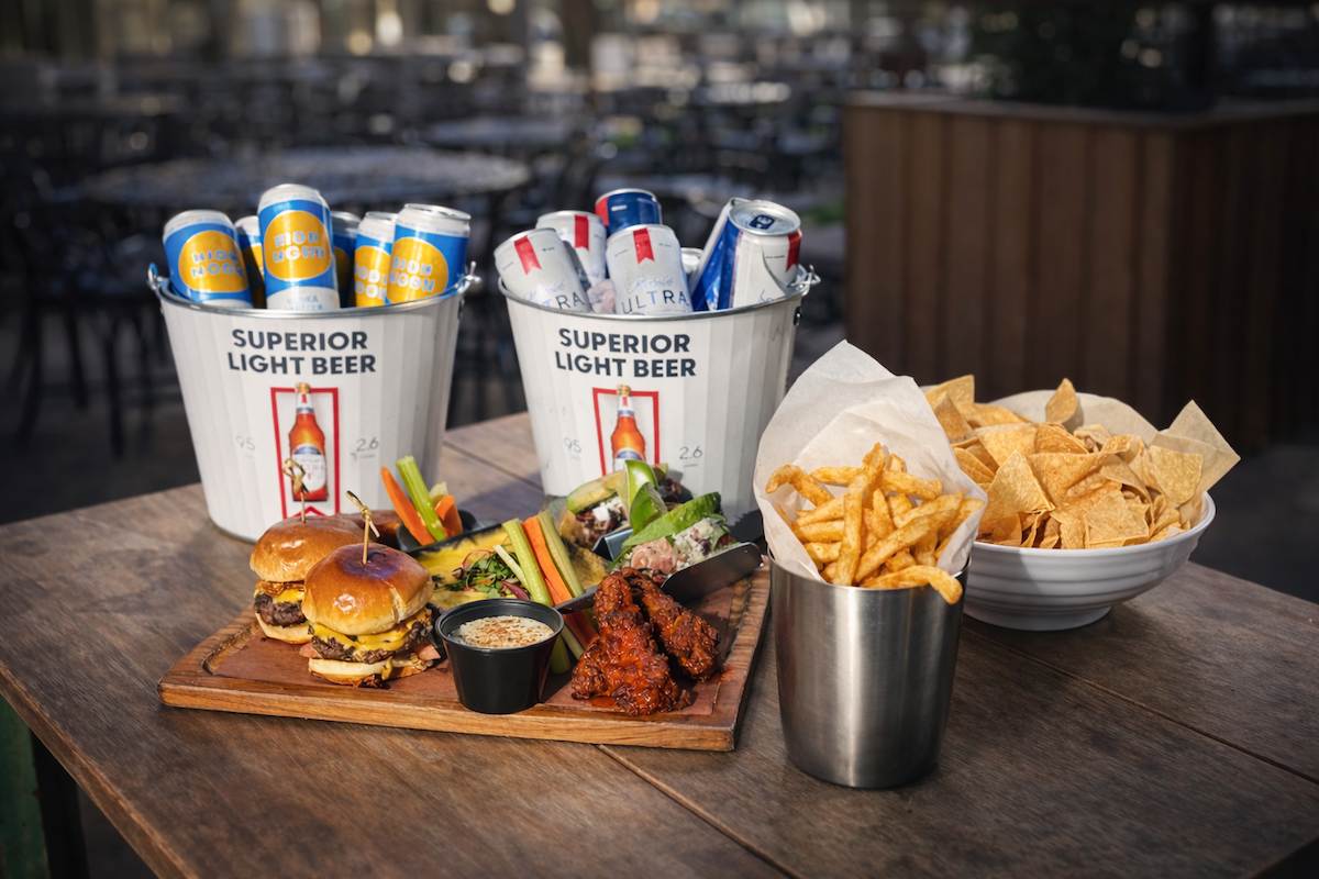 Game day boards and beer buckets at Bayou Heights Bier Garten. | Photo by Emily Vitek