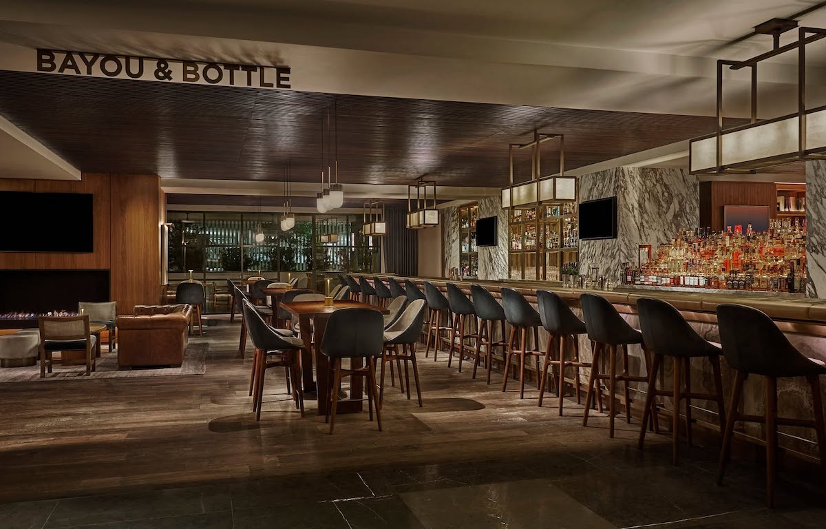 The long stretch of bar within Bayou & Bottle inside the Four Seasons Hotel. | Photo by Four Seasons Hotel Houston