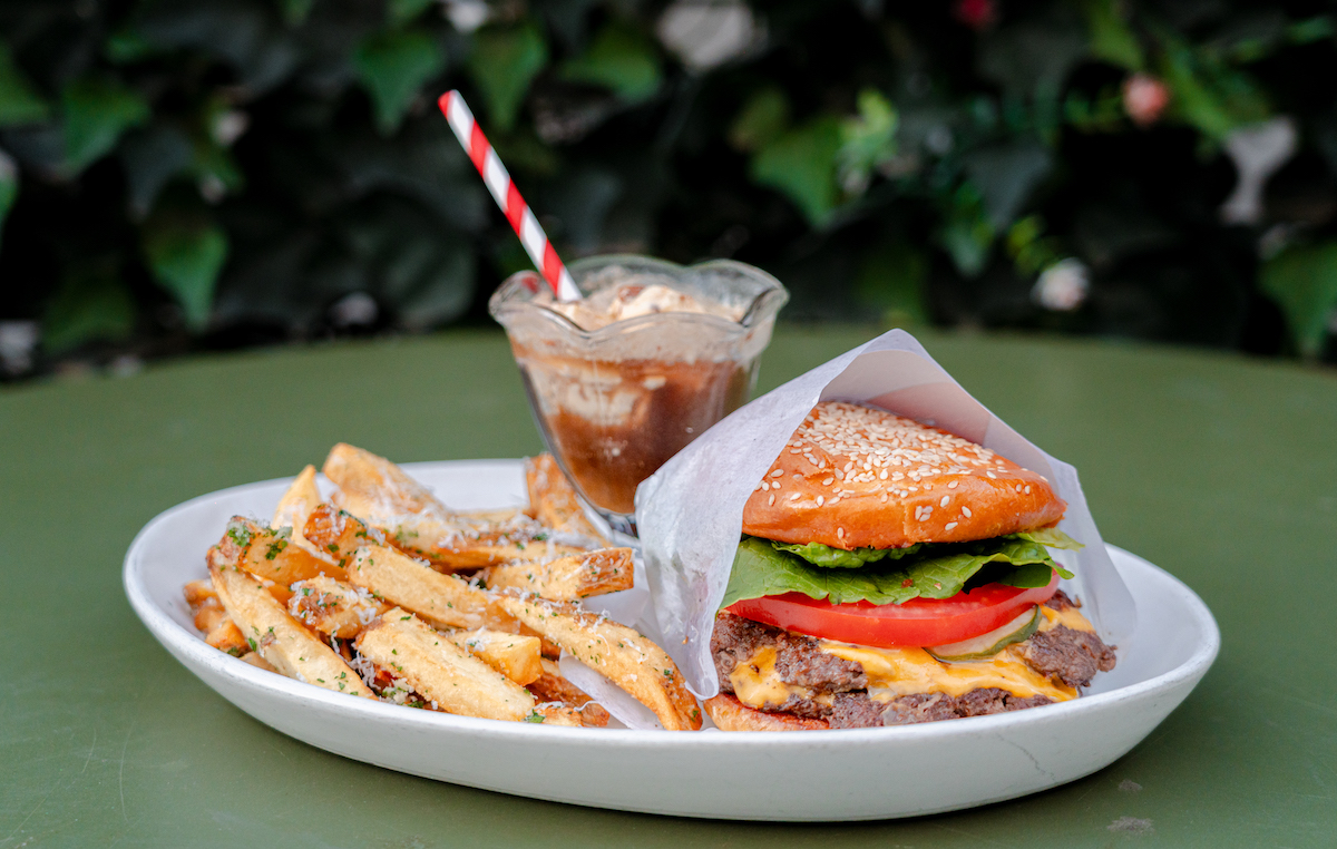 Belle Bar - DiningOut The A-Town Burger, served with Parmesan fries and a boozy float, is one of the playful menu offerings at Belle Bar, Joey Ward's new outdoor patio concept. | Photo by Belle Bar