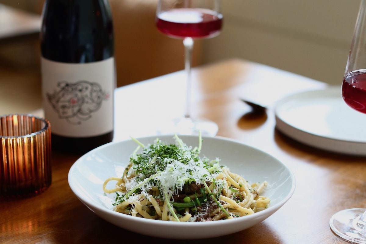 Bucatini with a glass of red wine is a classic combo. | Photo courtesy of Marigold
