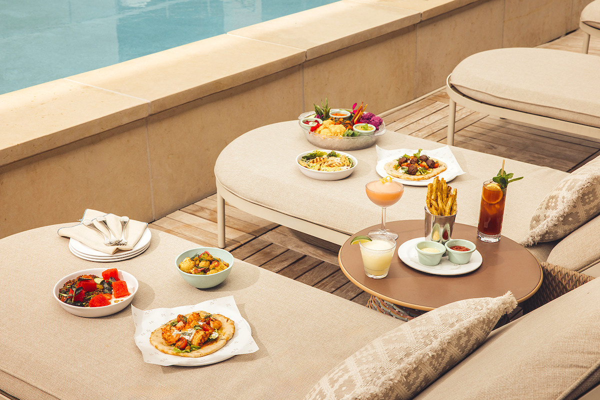From colorful crudités and grilled seafood to frozen cocktails, Whinny's pairs elevated fare with one of Fort Worth's chicest poolside settings. | Photo by Bowie House Auberge Collection