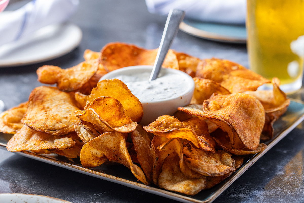 State Fare's popular dill pickle dip with chips. | Photo by Culinary Khancepts