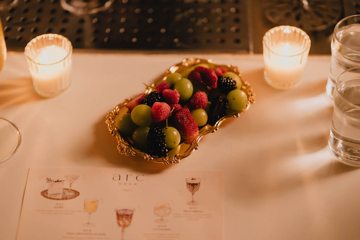 Seasonal accompaniments, including fresh fruit and light bites, help punctuate the five-course cocktail tasting at the Arc Room. | Photo by Jason Haas