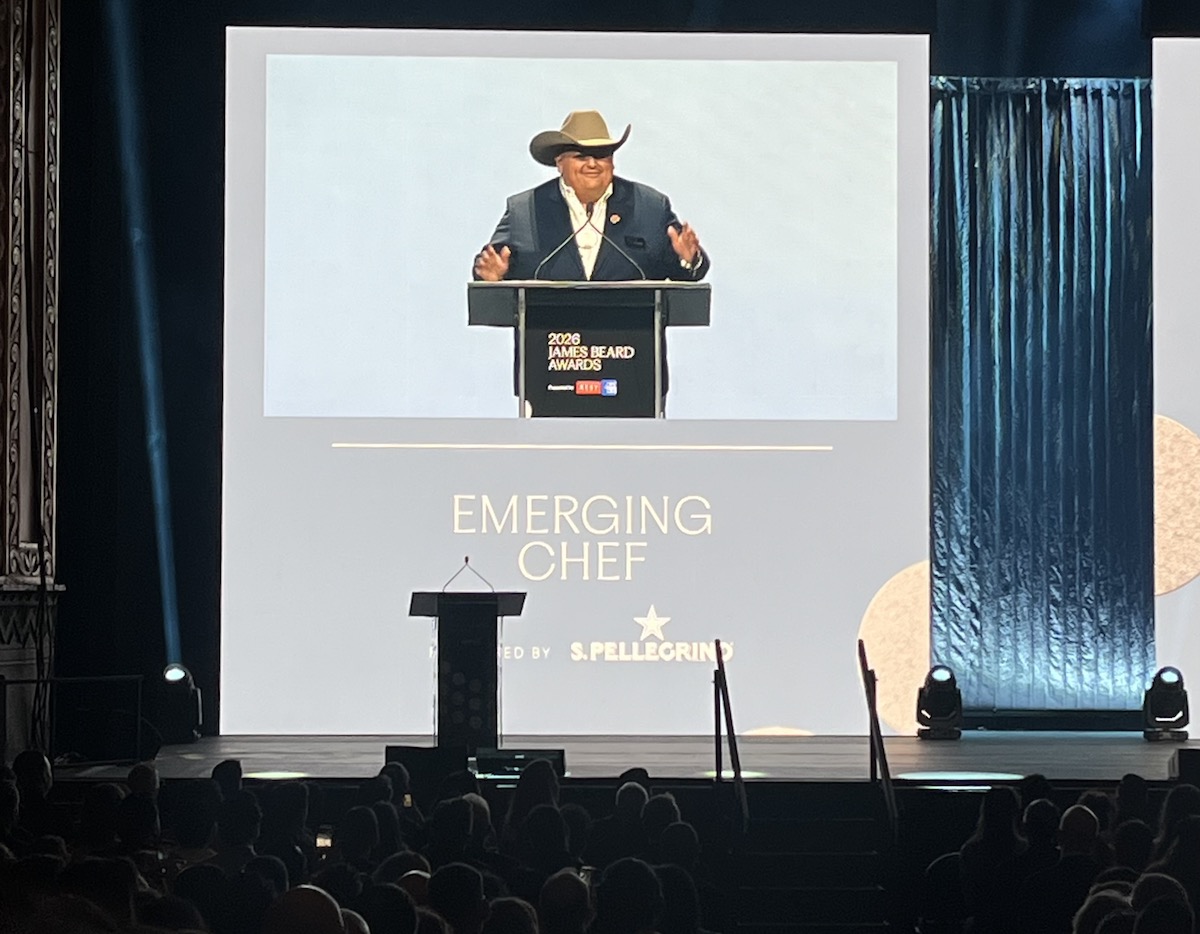 Adrian Torres, chef at Maximo in Houston, takes to the stage to accept the James Beard Award for Best Emerging Chef. | Photot by Paula Murphy