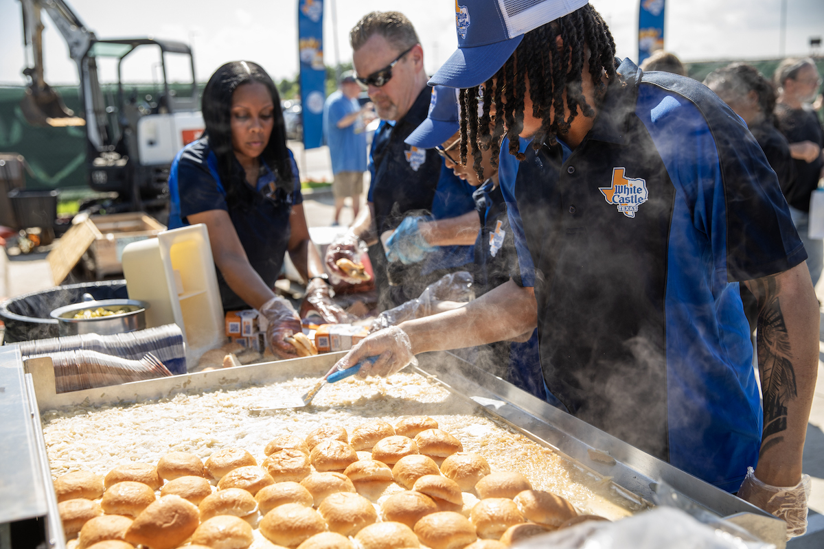 White Castle team members prepare the chain's iconic Sliders for guests during the groundbreaking cereminy at The Colony. | Photo by White Castle Texas