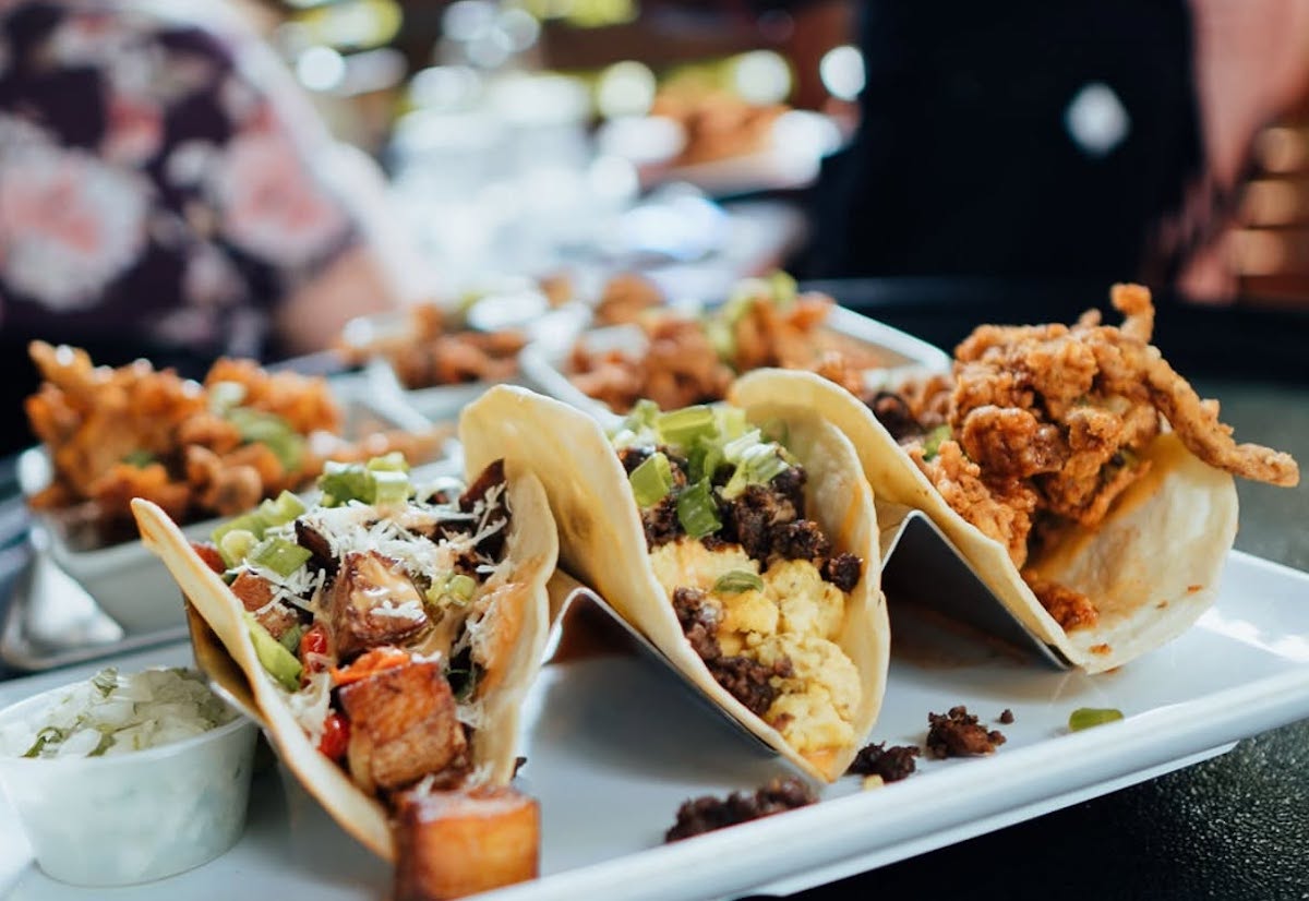 A trio of plant-based tacos at Mo' Brunch + Brews