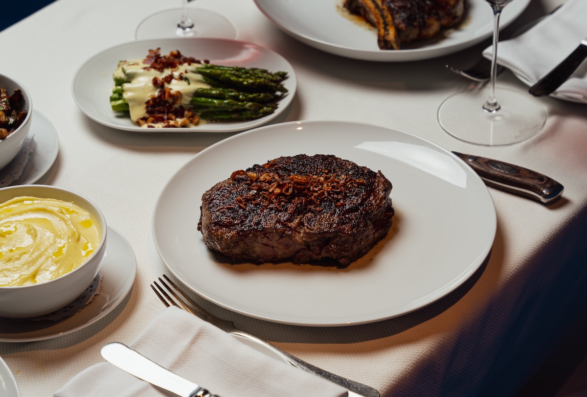 Naturally Delmonico’s serves some of the best steak in town. | Photo courtesy of Simon Tschoukriel