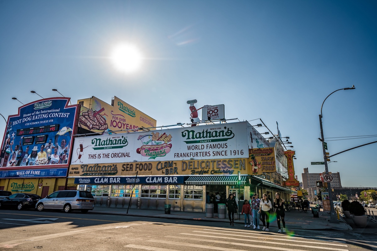 Nathan's Hot Dogs are famous all over, and the original shop is in Coney Island. | Photo by asiatoc