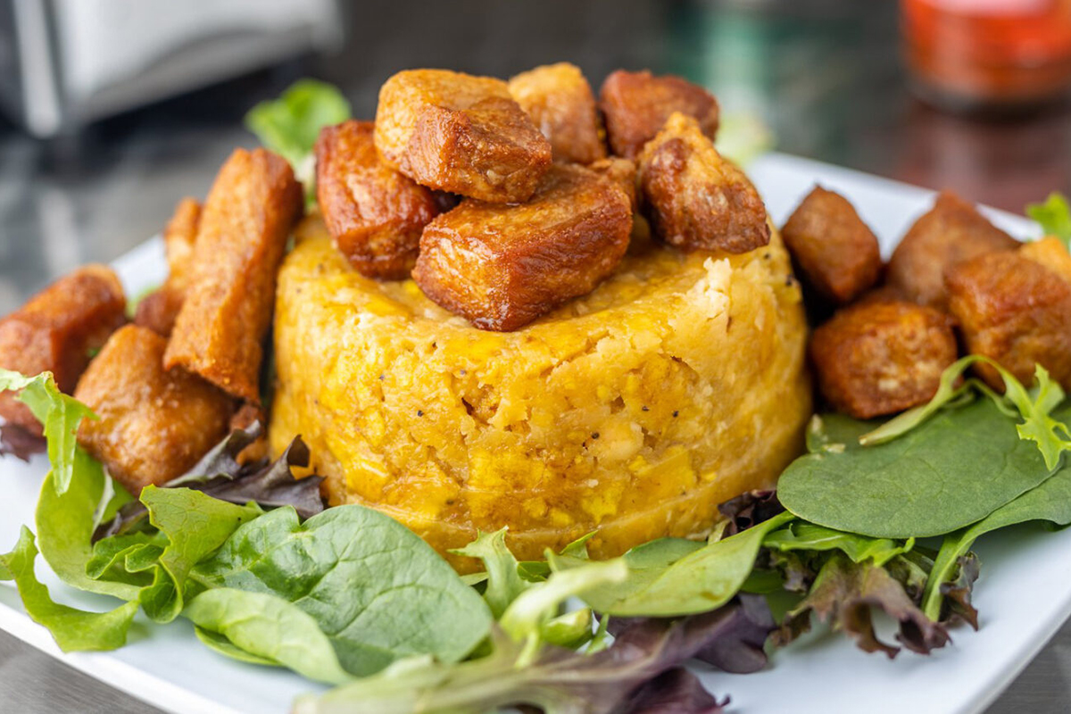 PHX _Phoenix Coqui_mofongo - DiningOut Mofongo is a traditional Puerto Rican dish made with fried plantains and pork. | Photo courtesy of Phoenix Coqui