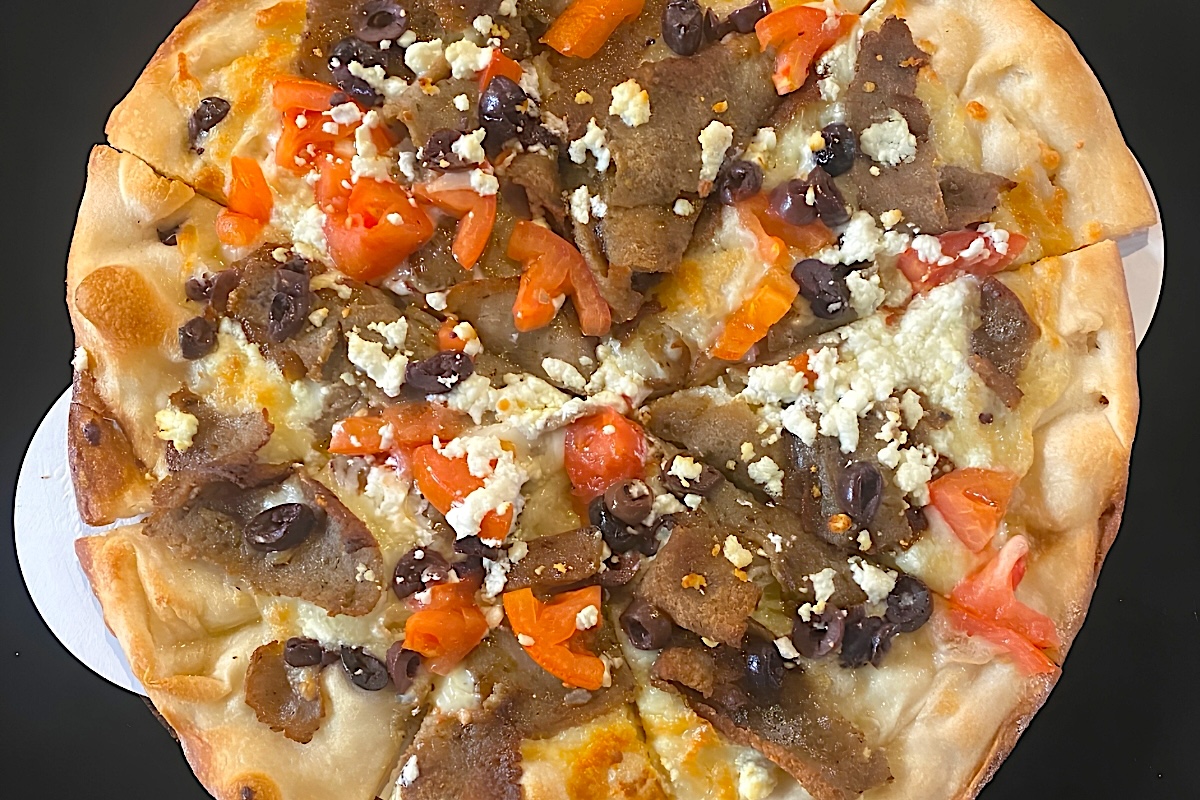 The Greek Pizza is a must-try dish. | Photo courtesy of George's Kitchen