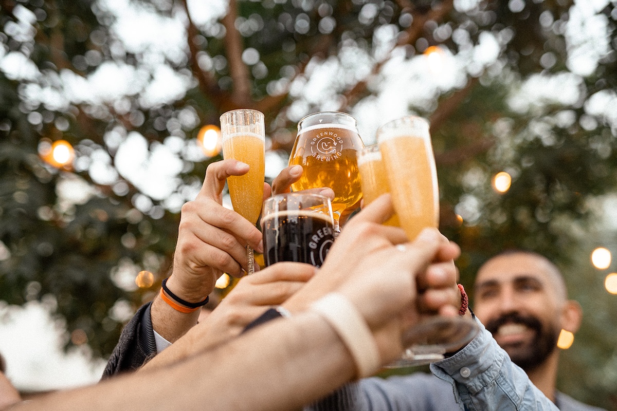 Cheers with a great beer. | Photo courtesy of Greenwood Brewing