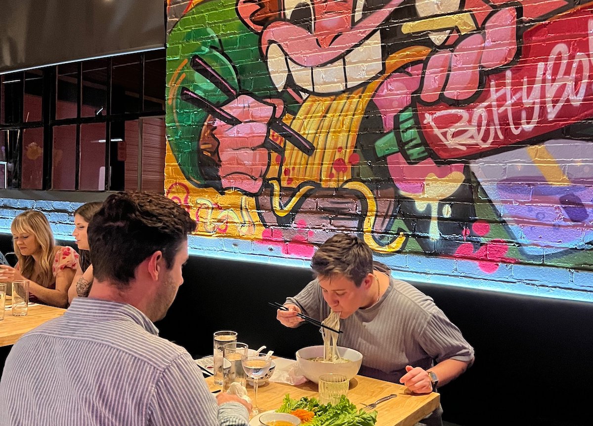Pretty Boy combines Vietnamese comfort food, Southeast Asian-inspired cocktails, and vibrant street-art decor in Athens’ Normaltown neighborhood. | Photo by Pretty Boy Diners