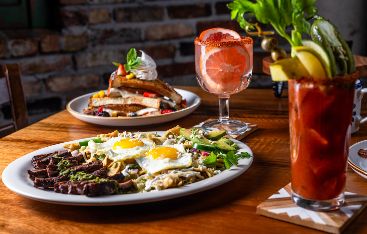 Escalante's - DiningOut Brunch done the Escalante’s way—steak chilaquiles topped with sunny-side eggs, French toast, and signature cocktails. | Photo by Escalante's