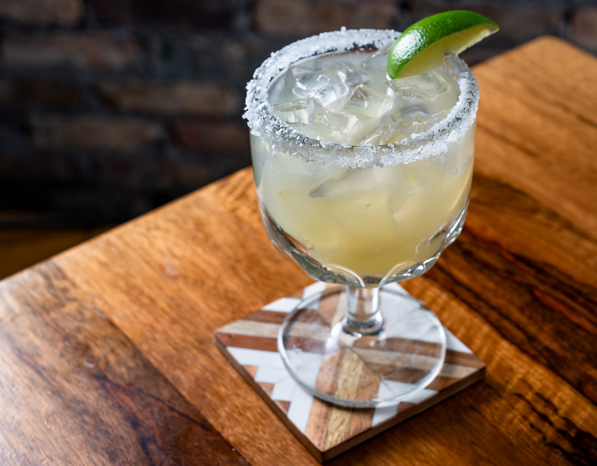 Escalante's - DiningOut A handcrafted margarita served ice-cold with a salted rim and fresh lime garnish at Escalante's. | Photo by Escalante's