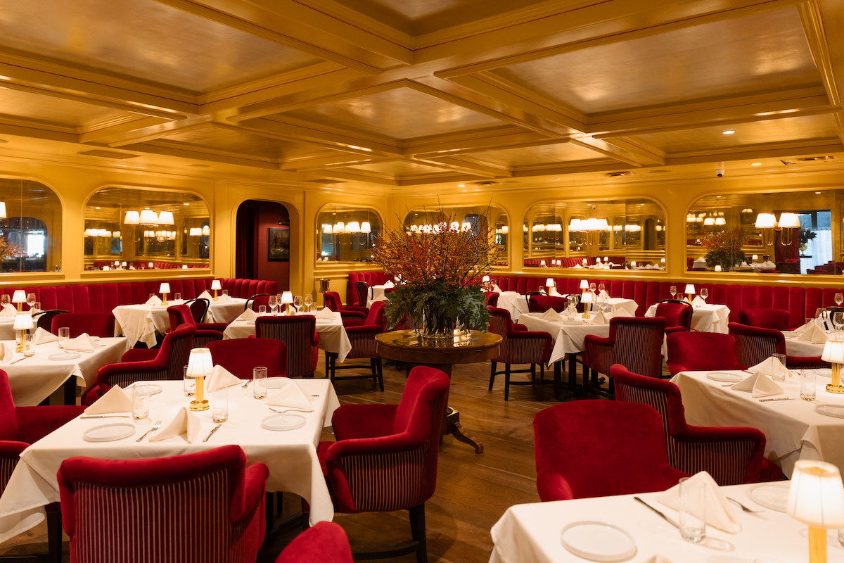 Luella - DiningOut Luella’s main dining room pairs velvet seating, warm lighting and mirrored walls to create the intimate atmosphere Revival Restaurant Group envisioned for its Buckhead Italian steakhouse. | Photo by Luella