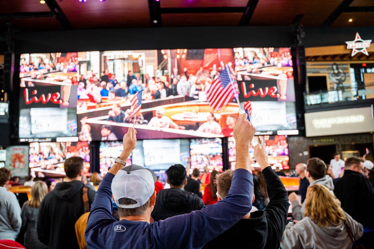 TexasLive-PCGermanBernon - DiningOut Fans wave their colors inside Texas Live!, where massive watch parties and wall-to-wall screens create a stadium-like atmosphere for World Cup matches. | Photo by German Bernon