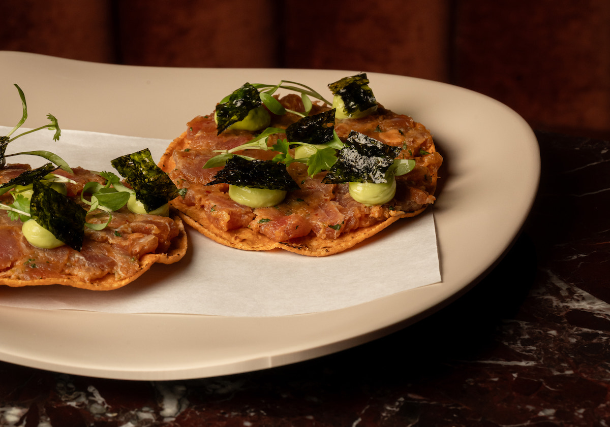La Cueva’s tuna tostada pairs fresh ahi tuna with avocado, herbs and nori on a crisp tortilla. | Photo by Lauren Lynn