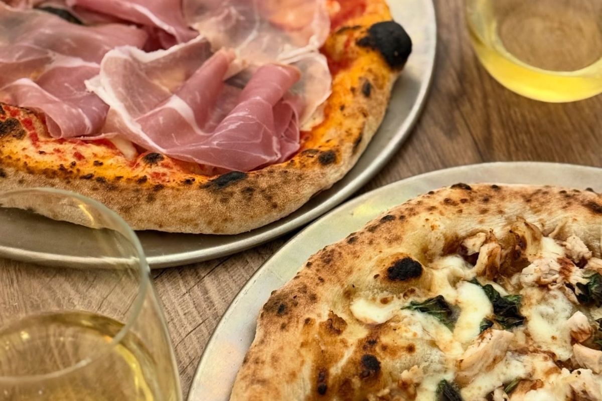 The prosciutto-loaded Margherita and spicy BBQ chicken pizzas from the rotating menu of Vincent Van Dough. | Photo courtesy of Vincent Van Dough
