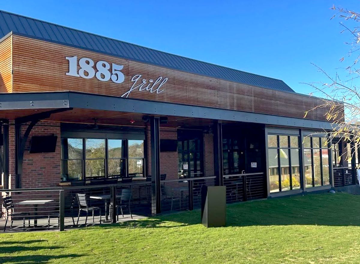 The modern exterior of 1885 Grill has become a centerpiece of Downtown Acworth's dining scene, helping anchor the city's ongoing revitalization. | Photo by 1885 Grill