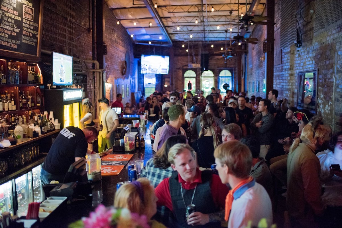 Allgoods First Floor Bar - DiningOut A packed house at Allgood reflects the lively atmosphere that has made the Downtown bar a longtime Athens favorite. | Photo by Allgood