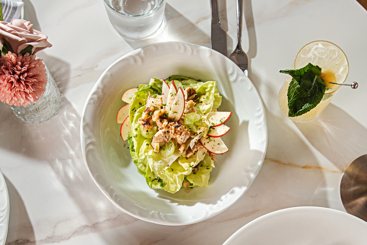 Brasserie Lundy - DiningOut Brasserie Lundi's refreshed summer menu features bright seasonal dishes, including its new Chicken Waldorf Salad. | Photo by Sarah Cofer