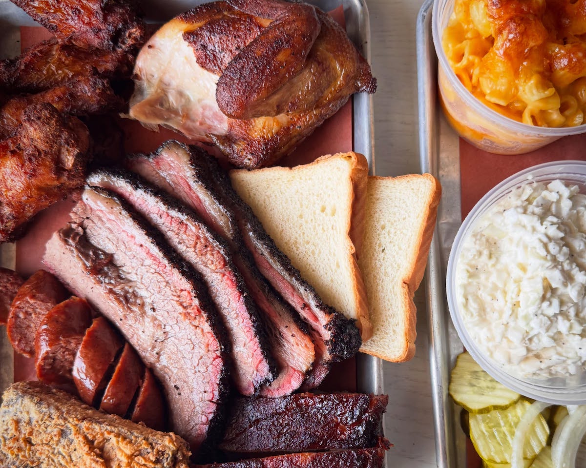 Brisket BBQ Spread at Fox Bros credit Fox Bros - DiningOut A barbecue spread of smoked meats and sides at Fox Bros. Bar-B-Q. | Photo by Fox Bros. Bar-B-Q