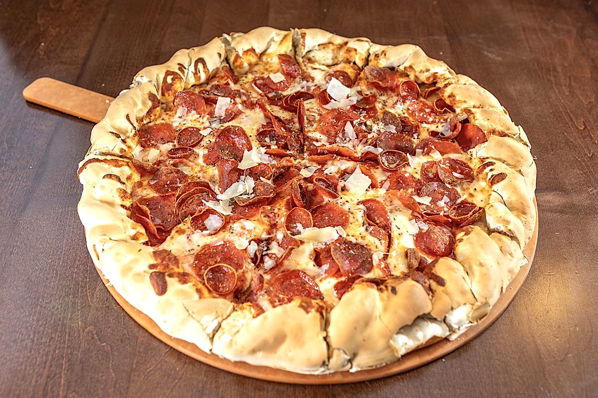 DEN_Beau Jos_Triple_Pepperoni_mountain_pie - DiningOut Visit the original location for Colorado-style mountain pies. | Photo courtesy of Beau Jo’s