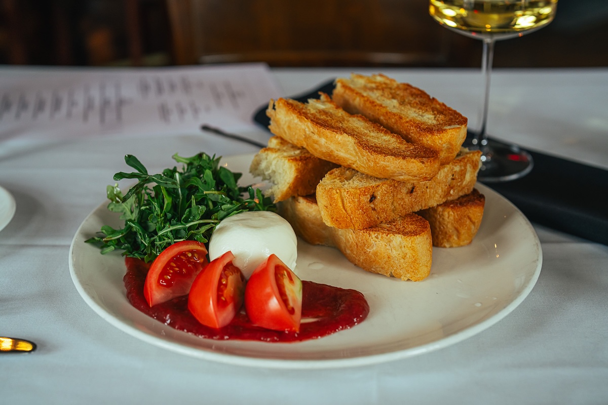 Chef John Wilson created garlic scape focaccia for Bella Colibri. | Photo by Behind the Apron Media